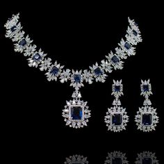 For edgy style and sophisticated sparkle, this necklace set is a dream come true! Elegant and shimmering set with CZ and sapphire stones creating a flawlessly fresh finish for each and every one of your evening ensembles. The set includes a necklace and a pair of beautiful earrings. Approximate earrings length is 2.1". Designed over a high-quality brass as base metal. Available in 3 plating options. Almina Set (Silver) is in-stock & ready-to-ship. Delivery time frame for other options is 5-7 wee Sapphire Jewelry Set, Unique Gift Cards, Sapphire Stones, Heritage Jewellery, Edgy Style, A Dream Come True, Faux Stone, Sapphire Necklace, Head Accessories