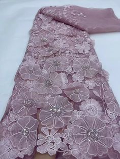 elevate your designs with our exquisite Lace Fabric. this  lace fabric is perfect for wedding gowns, evening dresses, and other special occasion outfits. Explore our collection now and unleash your creativity. African Wedding Jewelry, Water Soluble Fabric, Corded Lace Fabric, Bridal Lace Fabric, African Maxi Dresses, Bridal Accessories Jewelry, Cord Lace, Womens Wedding Dresses, Crystal Clutch