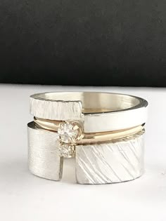 Happy Choices Stacking Rings by Dagmara Costello (Gold, Silver & Stone Ring) | Artful Home Gold And White Gold Rings Together, Silver And Gold Rings Together, Wide Wedding Bands For Women, Engagement Rings Without Diamonds, Two Stone Diamond Ring, Wide Band Wedding Ring, Modern Diamond Ring, Wide Diamond Bands, Wide Band Diamond Rings