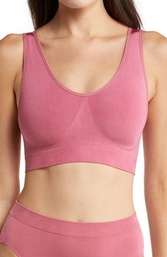 Smooth and stretchy fabric shapes a soft bralette designed with seamless construction for all-day comfort and a wide underbust band that provides light support for smaller figures. Knitting between the cups creates natural shaping and definition. Removable soft cups Partially lined Nylon/spandex Hand wash, line dry Imported Women's Clothing Solid Sculpting Bra With Built-in Support, Shapewear Sports Bra With Removable Pads, Soft Touch Stretch Push-up Sports Bra, Push-up Stretch Sports Bra With Soft Touch, Solid Color Full Coverage Seamless Bra, Seamless Full Coverage Solid Color Bra, Seamless Shaping Full Coverage Bra, Solid Color Sports Bra With Shapewear Style, Full Coverage Shaping Seamless Bra