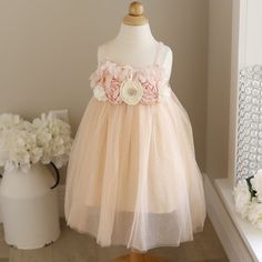 This Beautiful Wispy Pale Apricot Layered Tulle Dress Is Dreamyand The Perfect Little Party Dress! With Two Layers Of Tulle, The Top Layer Is A Soft, Sheer Layer With Fine Lattice Design With Iridescent Dots. Underneath Is A Solid Layer Of Supersoft Peach Apricot Matching Tulle, Then Lined By A Pale Peach Cotton Slip. The Stretchy Spaghetti Straps Are Adjustable. The Upper Front And Back Is Adorned With Layers Of Soft Chiffon Petals. The Final Layer On The Bodice At The Neckline Are Hand-Sewn Fa Cute Tulle Dress For Dress-up, Sleeveless Fairy Dress For Summer Pageant, Summer Sleeveless Fairy Dress For Pageant, Cute Cream Princess Dress For Summer, Cream Princess Dress For Summer Dress-up, Summer Cream Princess Dress For Dress-up, Cream Sleeveless Princess Tutu Dress, Sleeveless Tulle Princess Dress For Garden Party, Sleeveless Spring Fairy Dress For Pageant