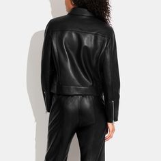 100% lamb leather Lining: 58% polyester 42% viscose Zip closure Slip pockets Length: 19 1/2 Model is 5'10 (178cm) chest 31 (79cm) waist 24 (61cm) hips 35 (89cm) and wears a size S Style No. CG669 Fall Leather Biker Jacket With Lapel Collar, Leather Biker Jacket With Lapel Collar For Fall, Collared Leather Jacket For Work In Winter, Winter Workwear Leather Jacket With Pockets, Spring Leather Biker Jacket With Collar, Collared Leather Biker Jacket For Fall, Sleek Leather Jacket With Pockets For Work, Sleek Leather Jacket For Work With Pockets, Leather Jacket With Lapel Collar And Pockets For Fall