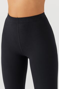 Slimming full length high-rise legging with an elastic waistband. Body contouring fabric that feels like a second skin Super soft and stretchy Hugs curves for a sleek and sculpted look Designed to retain its shape all day long, wear after wear Color: Sueded Onyx Sizing: X/S (0-4), S/M (4-8), M/L (8-10) Model is 5'8" and wearing size X/S Fabric: 76% Polyester, 24% Spandex Care: Machine Wash Cold With Like Colors. Care: Lay Flat to Dry. Made in Los Angeles