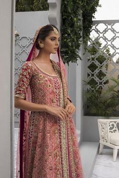 Varying hues of pinks and fuschia, counterbalanced with celadon and vermillion, this cotton net peshwas is crafted with meticulous attention to detail. The handcrafted techniques in traditional zardoze, sequins and gota work pay homage to elegance and magnificence. The net dupatta mirrors the hints of colour through it Pishwas Lehenga, Pakistani Pishwas, Pishwas Pakistani, Nameera By Farooq, Dupatta Bridal, Mehendi Dress, Pakistani Bridal Dress, Lehenga Dupatta, Bridal Mehendi