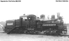 an old black and white photo of a train engine