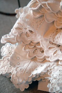 an image of white lace on fabric