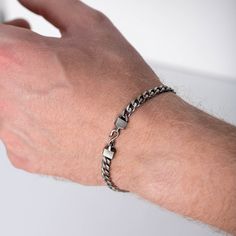 "Curb chain bracelet for men in oxidized sterling silver with a unique handmade hook at closure. An everyday piece of jewelry and a great choice as a Christmas gift for him. 100% handcrafted with love! F E A T U R E S * Metal: High-quality Sterling Silver 925 * Finish: Oxidized Silver * Style: Curb * Width: 5mm * Length: 19 - 23cm (7.5 - 9 inches) Sterling silver parts of the jewels are gold plated or rhodium plated in order to be strong, durable and resistant to tarnish. 100% nickel free. Deliv Adjustable Sterling Silver Curb Chain Bracelet Gift, Gunmetal Link Jewelry With Curb Chain, Minimalist Oxidized Finish Bracelets As Gift, Minimalist Oxidized Finish Bracelets For Gift, Minimalist Cuban Link Bracelet As A Gift, Sterling Silver Curb Chain Bracelet Gift, Minimalist Bracelets With Oxidized Finish As Gift, Minimalist Oxidized Bracelets For Everyday, Gunmetal Chain Link Bracelet As Gift