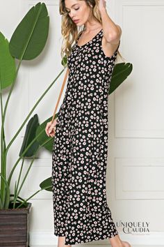 Get picnic ready in our casual-cool style EDGY PLUS: Maria Flower Power Jumpsuit! This feminine flower power ultra-soft and lightweight knit falls from wide tank straps, into a chic v-neck and rounded back. The sleeveless bodice leads into wide pant legs that hits you above the ankles, plus hidden side pockets...perfect for the woman on the go! Unlined 86% Polyester, 12% Rayon, and 2% Spandex Hand Wash Cold. Do Not Bleach. Hang or Line Dry. Imported Also available in Misses Casual Non-stretch Jumpsuits And Rompers For Spring, Summer Floral Print Relaxed Fit Jumpsuits And Rompers, Casual Printed Jumpsuits And Rompers For Spring, Sleeveless Floral Print Jumpsuits, Sleeveless Non-stretch Floral Jumpsuits And Rompers, Casual Printed Relaxed Fit Jumpsuits And Rompers, Printed Casual Relaxed Fit Jumpsuits And Rompers, Casual Relaxed Fit Printed Jumpsuits And Rompers, Beach Floral Print Stretch Jumpsuits And Rompers