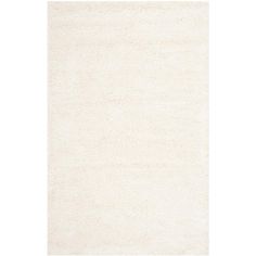 a white rug on a white background with no one in the room to see it