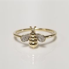 "Thanks for shopping our vintage estate store. We tend to sell well below wholesale and truly hope you enjoy all of our items. Many of the items are one of a kind, so please enjoy scrolling through the pictures and hopefully something will catch your eye. Spots are from the camera or reflections. Beautiful estate 10k yellow gold Honey Bee .10ct diamond ring. There are 22 diamonds in the setting. Ring Size: 7 Setting: 3/8\" by 1/2\" Weight: 1.49 grams Band width: 1.5mm Marked 10k." Bee Ring, Victorian Pendants, Gold Hamsa, Bee Jewelry, Bee Pendant, Heart Pendant Diamond, Cat Pendants, Chain Choker Necklace, Diamond Heart