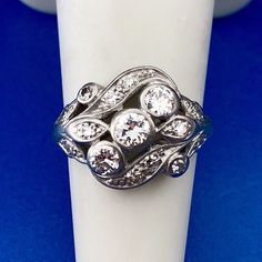 * Art Nouveau Art Deco Platinum Diamond Floral Cluster Engagement Cocktail Ring * Ring Size: 5.00 * Top of ring measures: 5/8" x 3/4" * Round Diamond carat weight: approximately .50 tcw * Diamond color: H-I * Diamond clarity: SI * Weight: 6.0 tgw * Marked: makers marks 50 plat * Condition: Great * Item will be shipped via Register Mail will being video surveilled with a Notary Public and two witnesses.  * (G54)    Exported By ExportYourStore :) Classic Multi-stone Diamond Rings, Classic Multi-stone Round Cut Diamond Ring, Art Deco Multi-stone Platinum Diamond Ring, Classic Sterling Silver Multi-stone Diamond Ring, Classic Multi-stone Sterling Silver Diamond Ring, Classic Multi-stone Diamond Ring In Sterling Silver, Classic 14k White Gold Multi-stone Rings, Formal White Gold Cluster Ring With Bezel Setting, Platinum Multi-stone Round Cut Rings