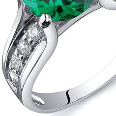 Look stunning in this vibrant Emerald Ring. Sterling Silver makes this jewelry luxurious and ultra versatile. Free Shipping. Style SR10820 Elegant Green Round Band Ring, Modern Green Rings With Prong Setting, Elegant Green Round Rings, Classic Green Ring For Promise, Sterling Silver Brilliant Cut Rings For May Birthstone, Green Jewelry For Promise Ring With Round Band, Sterling Silver Ring With Prong Setting For May Birthstone, Green Jewelry For Promise Ring In Round Band, Modern Green Jewelry With Prong Setting