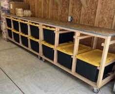 the storage area is filled with plastic bins