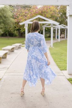 Embrace the season in style with the Avery Midi Dress. Detailing a blue and white abstract print with kimono sleeves and flirty deep v neckline. This midi is perfect for any casual day outings with a jean jacket and sandals or dressed up with heels for date night. Details & Fit: 100% Viscose Runs True to Size Hand Wash Cold Hang To Dry Deep V Neckline Kimono Sleeves Elastic Waist Abstract Print Design Blue | White | Printed Model is 5'6" and wearing a size Small Spring Blue Midi Dress With Surplice Neckline, Blue Midi Dress With Surplice Neckline For Spring, Spring Dresses With Kimono Sleeves, Spring Flowy Dresses With Kimono Sleeves, Spring Dresses With Flowy Kimono Sleeves, Spring Dresses With Flowy Fit And Kimono Sleeves, Flowy Spring Dresses With Kimono Sleeves, Blue Flowy Midi Dress With Surplice Neckline, Spring Dresses With Kimono Sleeves For Day Out