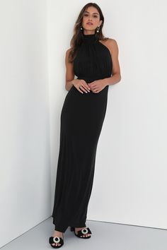 Classic glamour like the Lulus Romantic Chance Black Halter Backless Mermaid Maxi Dress will always impress! Slinky jersey knit fabric shapes this sultry dress that has a modified halter neckline with loop button closures. Bodice boasts a gathered design and a stunning open back that's sure to have all eyes on you! Skirt falls in a mermaid silhouette, finishing at a maxi hem. Hidden zipper/clasp at back. Stretch Ruched Maxi Dress For Night Out, Chic Stretch Evening Dress With Ruched Detail, Glamorous Stretch Evening Dress For Date Night, Stretch Ruched Maxi Dress For Date Night, Sleeveless Elastane Maxi Dress For Gala, Black Floor-length Halter Dress For Night Out, Fitted Maxi Length Halter Dress For Evening, Ruched Fitted Halter Dress For Evening, Fitted Ruched Halter Dress For Evening