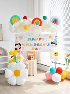 a birthday party with balloons and decorations