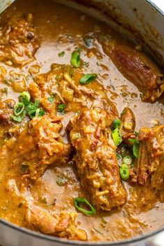 meat and vegetable stew in a large pot