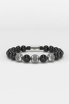 Introducing the Premium Bracelet, embodying the eternal quest for personal growth and self-realization. Its design, inspired by an infinite symbol in three dimensions, represents the mind, body, and spirit's interconnected journey. This piece symbolizes the relentless pursuit of one's true purpose, reminding us that in every mindful step lies the essence of life and the path to becoming the person we aspire to be. All our stones are chosen by hand to satisfy AAA quality standards. They are natural stones and their size and color can vary slightly. Stone: AAA Grade 10mm (Choose your favorite from available ones) Metal: 925 Sterling Silver / 24k Gold Plated / Rhodium over 925 Sterling Silver 100% Handcrafted Package: High quality velvet pouches Infinite Symbol, Engraved Metal, True Purpose, Onyx Necklace, Onyx Bracelet, Mens Beaded Bracelets, Metal Beads, Mind Body, Gold Vermeil