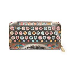 Add some retro flair to your style with our Retro Typewriter Wallet! Designed in pink and aqua, it comes with a coordinating zipper wallet, perfect for organizing your essentials. Match it with our Kitschy Typewriter Bag for a complete look. Get ready to make a statement with this unique and playful wallet! Yes it's quirky and not meant to be taken too seriously. It's fun, playful and most eye catching wallet anyone can have. This wallet is very quirky and fun. Anyway you carry it, it will sure Retro Wallets With Interior Card Slots, Retro Rectangular Travel Wallet, Retro Wallet With Interior Card Slots, Retro Style Rectangular Wallets For Daily Use, Retro Rectangular Wallets For Daily Use, Retro Wallets With Card Slots For Everyday Use, Vintage Multicolor Wallet For Daily Use, Retro Pink Wallet For Everyday Use, Retro Multicolor Wallets As Gifts