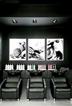 the salon is decorated in black and white