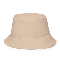 Inspired by the traditional barkcloth designs of the Pacific Islands, our Tapa Cloth print reversible bucket hat features bold tribal patterns on one side and a plain color on the other. This versatile and stylish hat gives you two unique looks in one, adding a touch of island charm to any outfit. Stay cool and stylish wherever you go!This reversible bucket hat can be worn on both sides, making it easy to match with different outfits. Made of breathable premium fabric, this hat will become your Brown Cotton Flat Brim Bucket Hat, Lightweight Brown Bucket Hat, Outdoor Bucket Hat In Solid Color, Natural Color Casual Bucket Sun Hat, Casual Natural Bucket Sun Hat, Adjustable Natural Color Bucket Hat, Adjustable Natural Bucket Hat, Lightweight Beige Bucket Hat, Casual Reversible Bucket Hat For Festival