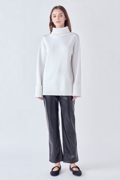 Our Turtleneck Sweater is both stylish and comfortable. It features a folded high neck long sleeves dropped shoulder and a pull-over design. Its unique design is perfect to keep you warm during the winter and also adds an elegant yet cool look when worn with a pair of jeans or a skirt. Soft to the touch you'll love to wear this statement-making sweater for any occasion. Get yours today and experience the ultimate in warmth and fashion! Folded high neck Long sleeves Dropped shoulder Pull over Han Turtle Neck Sweater, High Neck Long Sleeve, Cool Look, Contemporary Fashion, A Skirt, Turtleneck Sweater, Black Sweaters, Drop Shoulder, Neck Sweater