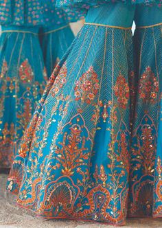 Bringing the essence of tradition and modernity, amyra sharara set is an attire that brings only adulations. The ensemble comprises of sharara pants with floral embroidery and embellishment. The peplum has an intricately done yoke, featuring a sheer layer of floral embroidery with dori at the back. Blue Bohemian Sharara For Reception, Bohemian Sharara With Traditional Drape, Blue Bohemian Palazzo Set With Zari Work, Anarkali Sharara With Resham Embroidery For Reception, Blue Palazzo Set With Intricate Embroidery For Diwali, Blue Embroidered Palazzo Set For Diwali, Bohemian Sharara With Resham Embroidery, Blue Palazzo Set For Reception And Festivals, Bohemian Palazzo Set For Reception With Traditional Drape