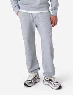 The rapha cotton sweat pants in light grey. these bad boys are made with 100% organic cotton for all-day comfort. with rapha's iconic script logo embroidered on the back pocket and an elastic waistband with a drawcord (perfect for those post-brunch bloats) these are a must-have for any non-serious laid-back wardrobe.    article fit & features —    — material : 100% organic cotton  — two hand pockets  — elasticated waistband with drawcord closure  — script embroidered logo at back pocket  — ribbe Sports Cotton Pants With Straight Hem, Gray Sweats With Elastic Waistband For Streetwear, Cotton Sweatpants For Sports With Straight Hem, Cotton Sweatpants With Straight Hem For Sports, Gray Cotton Sweats With Side Pockets, Gray Cotton Joggers With Ribbed Waistband, Cotton Sweats With Ribbed Waistband, Cotton Sweatpants For Streetwear With Straight Hem, Gray Cotton Sweats For Jogging