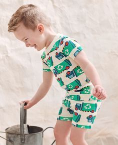 Earth Day Short John Pajama Set Green Short Sleeve Sleepwear With Relaxed Fit, Green Relaxed Fit Short Sleeve Sleepwear, Playful Short Sleeve Sleepwear For Loungewear, Playful Short Sleeve Sets Relaxed Fit, Green Short Sleeve Sets For Sleepover, Playful Short Sleeve Relaxed Fit Sets, Playful Relaxed Fit Short Sleeve Sets, Playful Green Tops For Sleepover, Playful Printed Short Sleeve Sleepwear