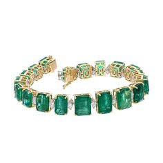 Rare find Zambian deep emerald bracelet 18k gold jewelry / Statement emerald bracelets / Stackable emerald bracelets jewelry for women STONE DETAILS : ❋ Stone : Emerald ❋ Stone Size : Mix Size ❋ Stone Shape : Emerald Cut ❋ Stone Weight : 36.950 Cts. Approx. ❋ Stone Type : Natural ❋ Diamond Weight : 1.690 Cts. Approx. ❋ Diamond Shape : Marquise ❋ Diamond Color & Quality : FG-Slightly Included ❋ Diamond Type : Natural METAL DETAILS : ❋ Metal Purity : Solid 18K Gold  ❋ Metal Color : Yellow Gold ❋ Bracelet Length : 6.75 Inches Approx. ❋ Gross Weight : 26.210 Gms. Approx. ❋ Gold Net Weight : 18.482 Gms. Approx. ❋ Making : Handmade ❋ Style Code : BR-0191 ------------------------------------- Note: For more products visit my shop through by below link: ❋ Social Media Links ➡️ Instagram :  @zoraya Luxury Emerald Bracelet Gift, Luxury Green Emerald Bracelet, Luxury Baguette-cut Emerald Necklace For Formal Occasions, Luxury Baguette Cut Emerald Necklace For Formal Occasions, Luxury Emerald Jewelry For Formal Occasions, Luxury Jewelry Baguette Cut Gemstone, Yellow Gold Bracelets With Jewels In Fine Jewelry Style, Luxury Baguette Cut Gemstone Jewelry, Luxury Yellow Gold Emerald Cut Bracelet