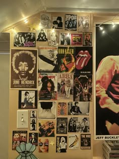 a wall covered with posters and lights