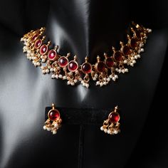 Brass alloy necklace with stonework and pearly beading. Product Dimensions (inches): L: 1 B: 8.5 H: 0.3 Red Necklace Set, Red Studs, Bubble Necklaces, Red Necklace, Wedding Jewellery Necklace, Wedding Necklaces, Wedding Necklace, Necklace Set, Wedding Jewelry