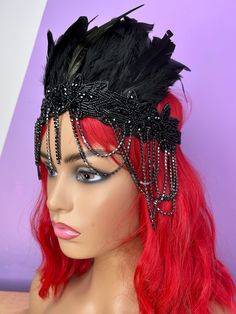 A one of a kind handmade Statement black Feather & beaded chain trim Head Dress from Zedhead Headwear On a black elasticated around the head band.   One size fits all / Adults Flapper Girl / Festival headdress / Headpiece / black headdress / festival hairband / chain headdress / beaded headdress / carnival crown / vintage headdress / 1920s headdress Please follow us on Instagram for new products & updates  : https://www.instagram.com/zedhead_headwear Party Crown Headpiece With Beads, Black Party Headband, Carnival Beaded Adjustable Headpieces, Carnival Adjustable Beaded Headpiece, Black Crown Headband For Party, Black Crown Costume Hat For Masquerade, Black Crown Costume Hats And Headpieces For Masquerade, Adjustable Punk Costume Hats And Headpieces, Adjustable Punk Style Costume Hats And Headpieces