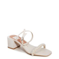 Elevate your dressy look to the next level with these women's Dolce Vita Zalima vanilla (white) heeled evening sandals. Fashioned with textile upper, these dressy sandals flaunt a trendy square open toe, appealing decorative faux pearl beads at the toe strap, and an adjustable ankle strap with buckle closure for that perfect fit. The synthetic outsole with covered block heel completes the look. | Dolce Vita Women's Zalima Evening Sandal in Vanilla Size 6 Medium Dressy Sandals, Evening Sandals, White Heels, Dolce Vita Shoes, Pearl Beads, Wedge Heels, Shoes Boots, Wedge Sandals, Women's Shoes Sandals