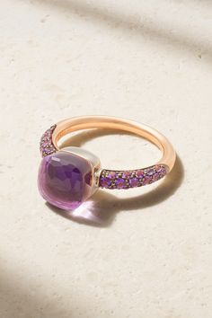 Pomellato's 'Nudo Classic' ring shimmers in gorgeous, regal shades of purple. Cast from rhodium-plated 18-karat rose and white gold, it's set with a faceted amethyst and layered with a 4.90-carat jade. 32 smaller amethysts stud the band, enhancing the other stones' natural beauty. Luxury Rose Gold Rings With Accent Stones, Luxury White Gold Amethyst Ring, Luxury Rose Gold Amethyst Ring, Luxury White Gold Amethyst Ring With Diamond, Luxury Pink Amethyst Ring For Formal Occasions, Elegant Purple Rings With Polished Finish, Elegant Multi-stone Amethyst Ring, Elegant Purple Ring With Polished Finish, Elegant Amethyst Rings With Gemstone Accents