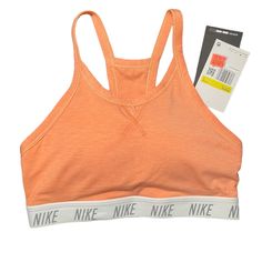 Nwt Nike Orange Sports Bra With White Band On The Bottom. Removable Pads Included. Brand: Nike Size: S Material: 68% Polyester 17% Lyocell 15% Spandex Condition: Nwt Cotton Fitted Activewear For Light Sports, Spring Athleisure Sports Bra For Sports Events, Fitted Cotton Activewear For Light Sports, Nike Sports Bra For Spring Sports, Nike Activewear For Summer Sports Events, Cotton Sports Bra For Workout In Spring, Spring Cotton Sports Bra For Workout, Spring Sportswear Activewear, Spring Workout Cotton Sports Bra