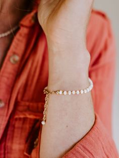 The Mother of all pearls! Ashley in Mother of Pearl with her tiny flecks of gold or silver is a fresh addition to your jewelry collection. Finished with a tiny, dangling pearl at the clasp makes this bracelet even more feminine and fun. Healing Properties: HarmonyAdaptabilitySensitivity We look for flashes of pearly iridescence from within the natural shell for each stone to give this simple bracelet the beauty and allure to be worn alone or stacked with others for even more impact. The unique h Bracelet Template, Mother Of Pearl Bracelet, Sodalite Necklace, Pyrite Necklace, Ashley Black, Lapis Pendant, Carnelian Necklace, Black Onyx Necklace, Mother Of Pearl Necklace