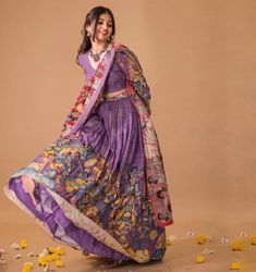 lehenga set  |womens kalamkari lehenga choli |crop top lehenga set |designer kalamkari lehenga dupatta | wedding lehenga choli | hand painted kalamkari lehenga usa Women's lehenga set /kalamkari embroidered lehenga skirt/voggish      lehengas are one of the beautiful and versatile traditional attires of india !! we carry such pieces in budget with great quality that can be styled in multiple ways with different outfits !!       Here is Beautiful lehenga set in lavender with pure silk hand painted authentic kalamkari set in which skirt has hand painted big border pattern  paired with matching full sleeve hand embroidered kalamkari blouse as shown!! This set comes with contrast all over kalamkari hand painted dupatta as shown , skirt has heavy gear and both pieces can be mix and matched with Luxury Blouse Piece With Kalamkari Print For Puja, Luxury Semi-stitched Kalamkari Blouse Piece, Bollywood Style Kalamkari Print Sharara For Wedding, Bohemian Chanderi Choli With Sheer Dupatta, Wedding Lehenga With Kalamkari Print In Traditional Drape, Wedding Lehenga With Kalamkari Print, Bohemian Choli With Sheer Dupatta In Chanderi, Unstitched Kalamkari Wedding Choli, Anarkali Style Lehenga With Kalamkari Print