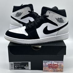 Elevate your sneaker game with these Nike Air Jordan 1 Mid SE Diamond sneakers in a classic black and white colorway. Perfect for casual wear, these limited edition shoes boast a mid-top silhouette with a faux leather upper material and medium shoe width. They come in men's size 10.5 (UK 9.5, EU 44.5) and have a style code of DH6933-100. These retro-inspired sneakers feature a Nike Air Diamond model with a throwback 80s and 90s theme. The shoes are 100% authentic guaranteed and include a domestic return for US customers. Ideal for basketball or any athletic activity, these shoes are sure to turn heads and make a statement.