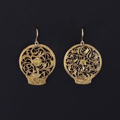 These antique earrings were created from Georgian watchcocks (circa 1780-1800) by adding yellow diamonds and 14k gold ear wires to the gold gilt (or pinchbeck) dangles. Each earring measures 1.25 inches from the top of the ear wire to bottom by 0.8 inches wide and are in great condition. We have many other fantastic offerings of period fine and costume jewelry posted on our Etsy store, so please consider browsing our other items. We send all items in individually packaged gift boxes and offer la Antique Yellow Gold Drop Earrings, Victorian Yellow Gold Drop Earrings, Victorian Gold Earrings For Formal Occasions, Formal Victorian Gold Earrings, Antique Gold Victorian Jewelry With Pierced Details, Antique 14k Gold Hallmarked Earrings, Antique Gold Victorian Jewelry, Victorian Style Ceremonial Earrings For Pierced Ears, Victorian Engraved Earrings For Formal Occasions