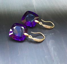 Purple Amethyst earrings. Ultra violet. Gold Pave earrings. Statement jewelry.  February birthday Elegant Purple Earrings For Pierced Ears, Elegant Amethyst Earrings For Party, Gold Amethyst Earrings For Parties, Amethyst Gemstone Earrings For Formal Occasions, Formal Amethyst Gemstone Earrings, Luxury Gold Amethyst Earrings, Elegant Amethyst Earrings For Formal Occasions, Purple Fine Jewelry Earrings For Gift, Elegant Amethyst Purple Earrings