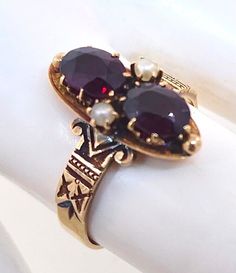 Thank you for viewing this beautiful antique Victorian 14k rose gold garnet and seed pearl ring.  The ring contains 2 oval garnets.  Each garnet measures approximately 7x5mm.   The ring size is 7.5.  The weight of the ring is 4.0 grams.  The ring comes with an attractive gift box.  An important thing to mention regarding condition descriptions of antique and vintage jewelry is its judgement criteria which is very different than that applied to modern jewelry.  The expectation for modern jewelry classified as being in "excellent' condition is an item that is possibly high polished and in close to new condition.  Antique and vintage jewelry is never supposed to be polished.  In fact, polishing antique jewelry can actually diminish its value and appeal.  Therefore, patina, mild surface scratc Antique Engagement Rings Victorian, Antique Ruby Ring, Seed Pearl Ring, Vintage Jewelry Antique, Antique Jewelry Rings, Antique Engagement Rings, Seed Pearl, Ruby Ring, Pearl Ring