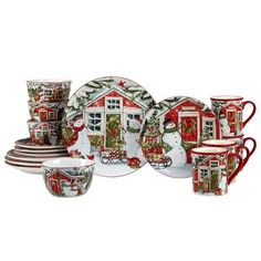 a set of christmas themed dishes and cups