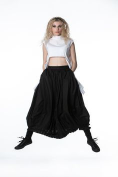 "This volume skirt are made from finest Italian cotton and designed to impress. Awesome shape, trendy cut, light fabric and multifunctional design. This pants made great appearance. All season purpose. Suitable for any occasions. It matches any MQM shirt or top. Made in Europe. ◈ We offer custom fitting without any extra charge, simply send us your measurements (height, across shoulders, bust, waist, hips). ◈ CARE INSTRUCTIONS For best results, dry clean only or wash at low temperature. Please s Voluminous Long Lined Skirt, Pleated Voluminous Skirt, Stretch Long Skirt With Gathered Details, Stretch Cotton Full Skirt, Stretch Cotton Full Skirt Bottoms, Long Voluminous Gathered Skirt, Voluminous Long Skirt With Ruffles, Baggy Long Gathered Skirt, Long Voluminous Ruffled Skirt