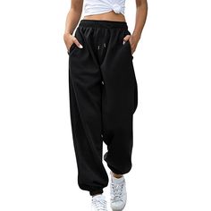 Women High Waisted Sweatpants Joggers Drawstring Athletic Pants With Pockets are the ideal fusion of fashion and coziness. These functional pants are made to move with you, giving you unrestricted freedom to run, jump, and stretch. They are suitable for the entire day because of the smooth, breathable fabric. These jogger pants are a stylish statement that can be dressed up or down thanks to their striking hues and modern style. Specifications: Fabric Type: Cotton, polyester Care Instructions: Baggy Harem Pants With Elastic Waistband, Full Length Bottoms For Leisure In Winter, Winter Full Length Bottoms For Leisure, Sporty Baggy Bottoms With Drawstring, Baggy Drawstring Sportswear Bottoms, Baggy Ankle-length Joggers With Elastic Waistband, Baggy Sportswear Bottoms With Drawstring, Fall Joggers With Drawstring And Loose Fit, Baggy High-waisted Joggers With Elastic Waistband