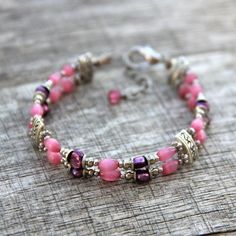 The bracelet is handmade using fresh water pearl and cateye. The fuchsia is a lively and feminine color, a nice blend of passion and tenderness The length of the earrings is 7-8 ¼ inches, 18-21. (excluding the length of hook) For matching earrings, please go to1: https://www.etsy.com/listing/95985512/earrings- For matching earrings, please go to2: https://www.etsy.com/listing/151339368/earrings?ref=shop_home_active For matching necklace, please go to: https://www.etsy.com/listing/118410657/neckl Bohemian Pink Pearl Bracelet For Jewelry Making, Pink Adjustable Bracelets For Bridesmaids, Adjustable Pink Pearl Bracelet Gift, Dainty Pink Beaded Bracelets For Wedding, Elegant Pink Hypoallergenic Bracelet, Delicate Pink Bracelets For Jewelry Making, Pink Round Beads Jewelry For Bridesmaid Gift, Elegant Pink Nickel-free Bracelets, Elegant Pink Hypoallergenic Beaded Bracelets