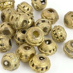 brass plated metal beads with holes in the middle