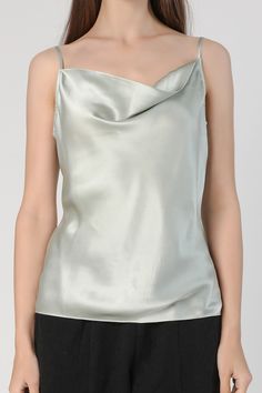 This graceful silk cowl neck camisole is made with premium mulberry silk. Adjustable shoulder strap allows you to tailor the neckline to your fitting. Style #: WWSH906 Spring Silk Tops With Cowl Neck, Sleeveless Silk Camisole, Solid Silk Sleeveless Camisole, Elegant Solid Color Cami Top, Elegant Cami Top For Formal Occasions, Elegant Formal Sleeveless Camisole, Elegant Formal Cami Top, Elegant Solid Color Cami Tank Top, Formal Silk Tank Top For Summer