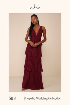 The ambiance of any room will be instantly more elegant when you walk in wearing the Lulus Mesmerizing Essence Burgundy Pleated Backless Tiered Maxi Dress! Airy, pleated woven chiffon shapes a sleeveless bodice with a flirty V-neckline and slender tying straps that secure above an even flirtier open back, all supported by wide shoulder straps. The flattering, empire-style waist tops a sweeping maxi skirt adorned with flouncy tiers throughout the A-line silhouette. Hidden back zipper/clasp. Fit: Elegant Tiered Maxi Dress For Date Night, Formal Tiered Pleated Dresses, Tiered Pleated Maxi Dress For Party, Pleated Tiered Maxi Dress For Party, Glamorous Pleated Maxi Dress For Night Out, Elegant Tiered Dress For Date Night, Chic Floor-length Pleated Dress For Party, Elegant Pleated Dress For Date Night, Elegant Night Out Dresses With Accordion Pleats