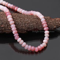 PRODUCT DETAIL : ITEM : PINK OPAL BEADED NECKLACE ITEM CODE :  DGC4789 ITEM NAME :NECKLACE GEMSTONE :  PINK PERUVIAN OPAL BEADS SHAPE : SMOOTH RONDELLE LENGTH :   SELECT FROM THE DROP DOWN MENU BEADS SIZE:  9 mm Approx. WEIGHT :  208 Cts. APPROX CUSTOMIZATION/BULK ORDER : AVAILABLE PLEASE FEEL FREE TO CONTACT IF YOU REQUIRE ANY FURTHER INFORMATION. Single Strand Pink Opal Necklace With Round Beads, Pink Faceted Beaded Round Necklace, Pink Faceted Beads Necklace, Pink Round Beaded Necklaces With Faceted Beads, Pink Round Beaded Necklace With Faceted Beads, Pink Gemstone Bead Necklaces, Beaded Pink Opal Necklaces For Jewelry Making, Pink Round Gemstone Beads Necklace, Pink Rondelle Polished Beads Jewelry